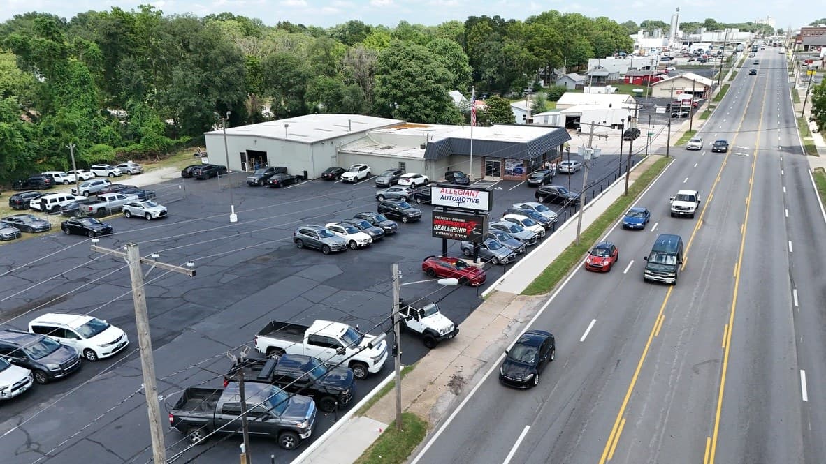 Allegiant Automotive on East Kearney Street, Springfield, from the air: the lot, the building and the sign